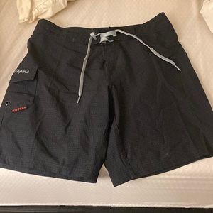 Board shorts for women with pocket in a size 4.